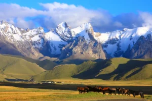 Stunning mountain lake in Kyrgyzstan/Kazakhstan - adventure travel from UAE